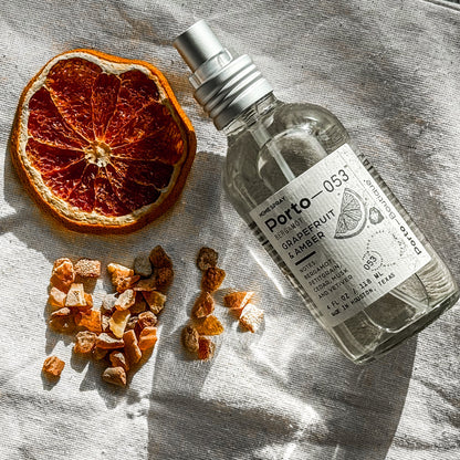 Porto-053 Room Spray – Linen & Fabric Freshener – High Fragrance Concentration – Vegan & Handmade in USA – 4 oz Clear Glass Bottle with decorative box - PoshaBella