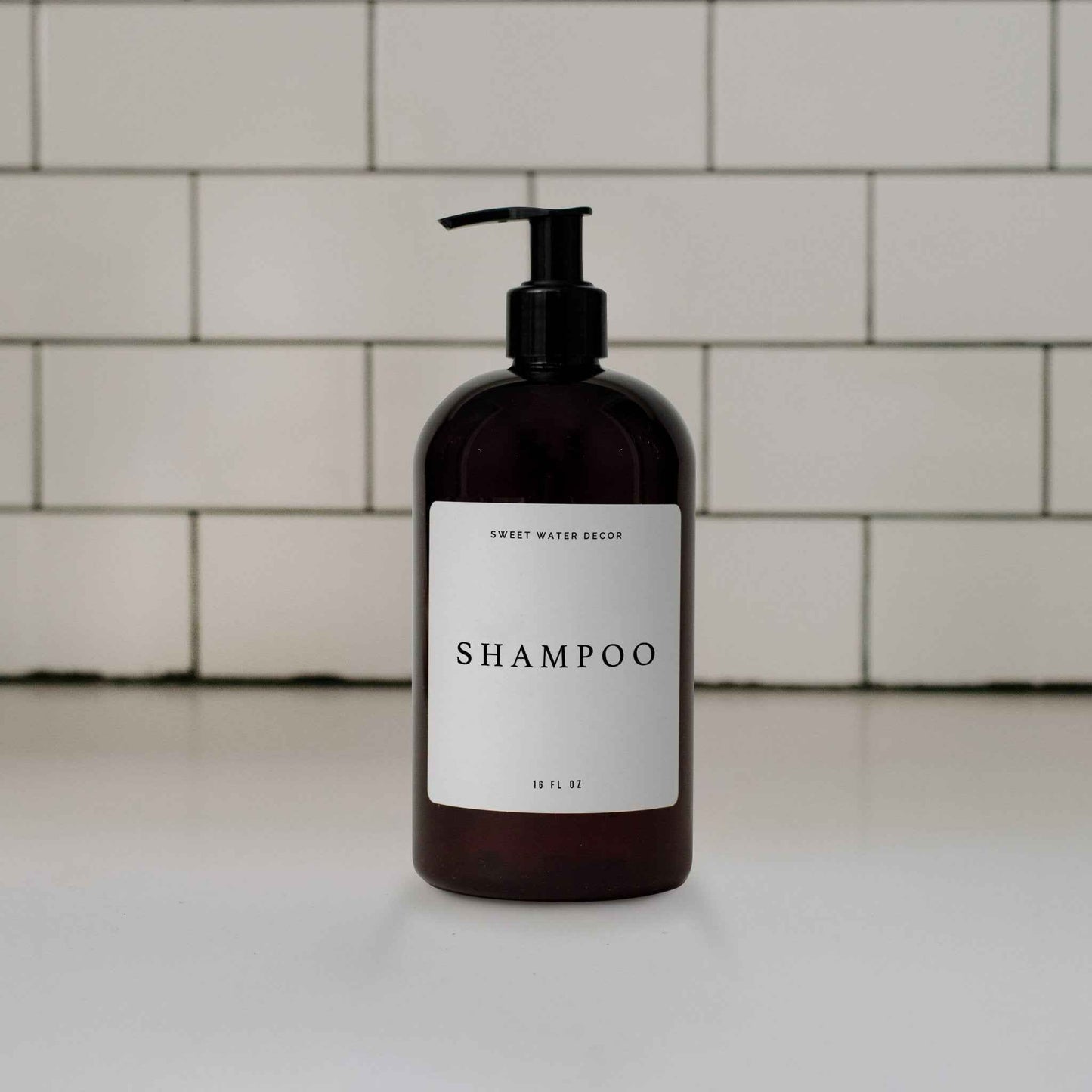 16oz Amber Plastic Shampoo Dispenser - White Text Label